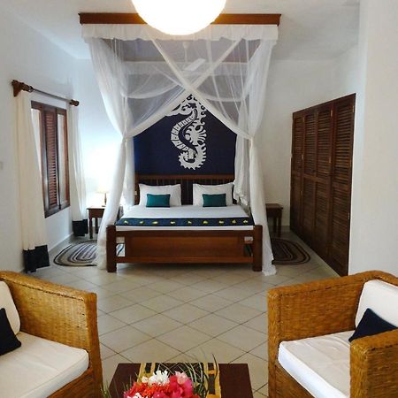Diani Cottages Diani Beach Esterno foto